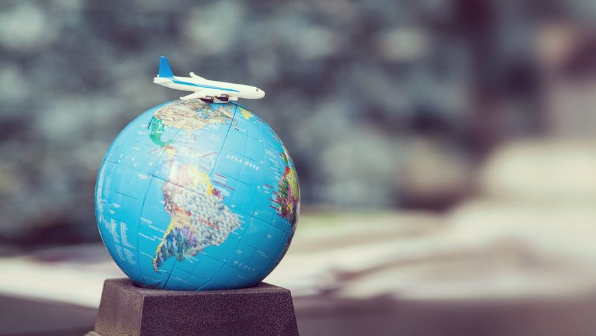 Miniature globe and little plane.